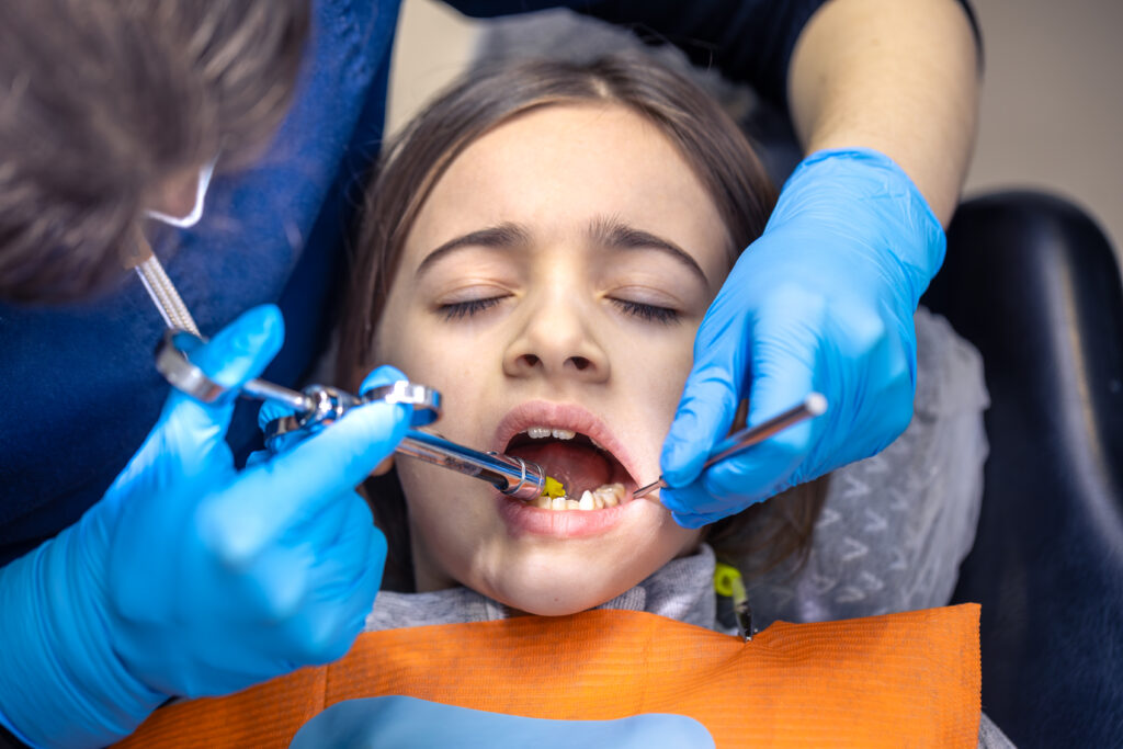 Child at an Invisalign First check-up at Mint Dental Care