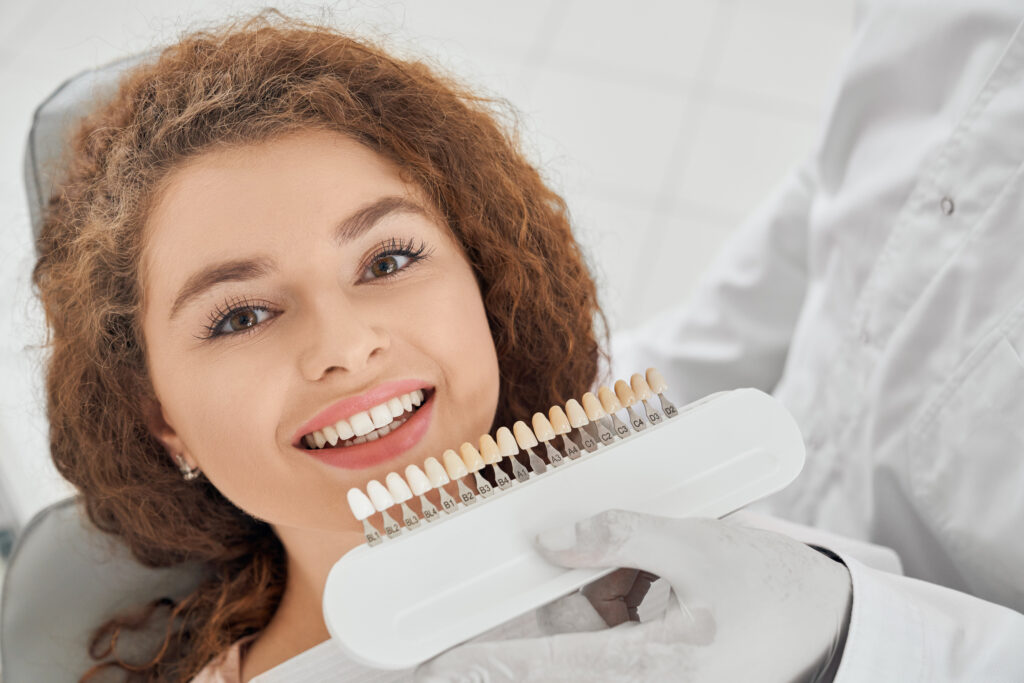 Patient smiling after gum depigmentation in Dubai