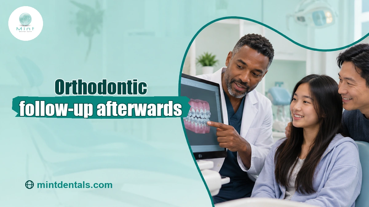Orthodontist reviewing a teenager's braces progress