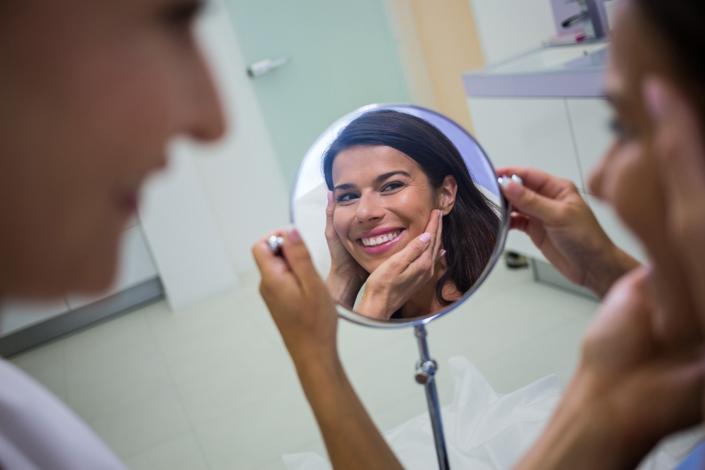 Patient after a professional oral cleaning at Mint Dental Care