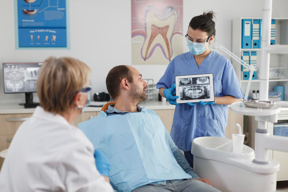 Patient receiving Zoom teeth whitening in a Dubai dental clinic
